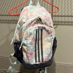 Adidas Backpack, covered in adidas as logo pastel colors.
